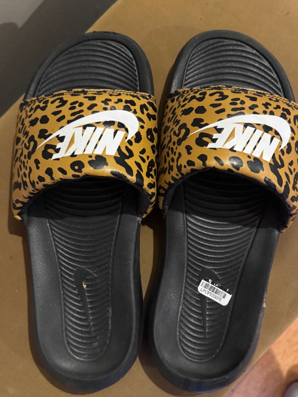 Nike Leopard Print Slide Sandals in Black and Tan